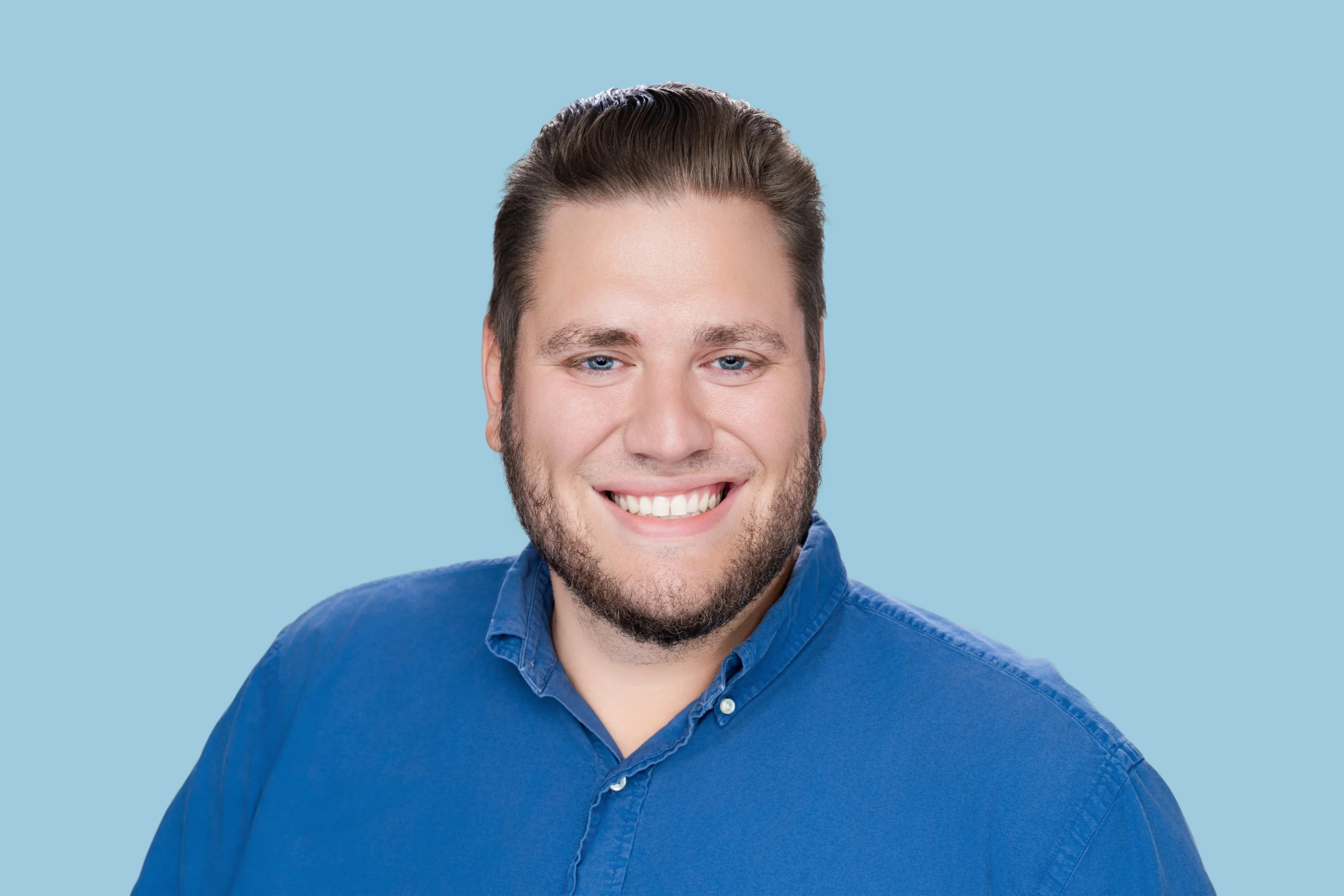 Photograph of Unlock employee John accompanying his testimonial about how he enjoys working at Unlock.