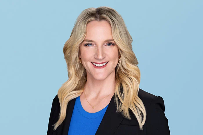 Photograph of Unlock's Chief People Officer Heather Bailey smiling and looking at the camera.