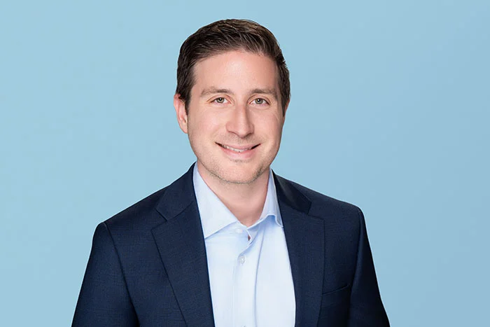 Photograph of Unlock's Chief Capital Officer Peter Silberman smiling and looking at the camera.